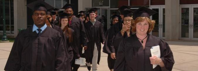 graduates marching in 