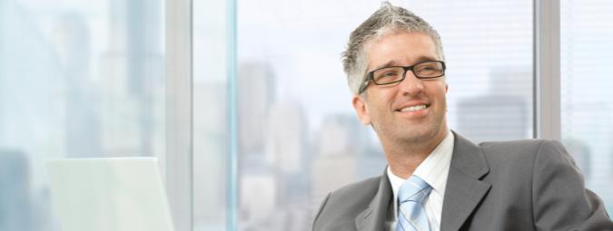 businessman smiling on in office 