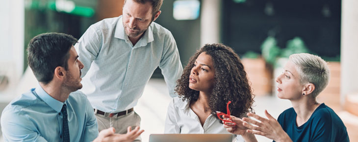 Group of entrepreneurs debating in the office